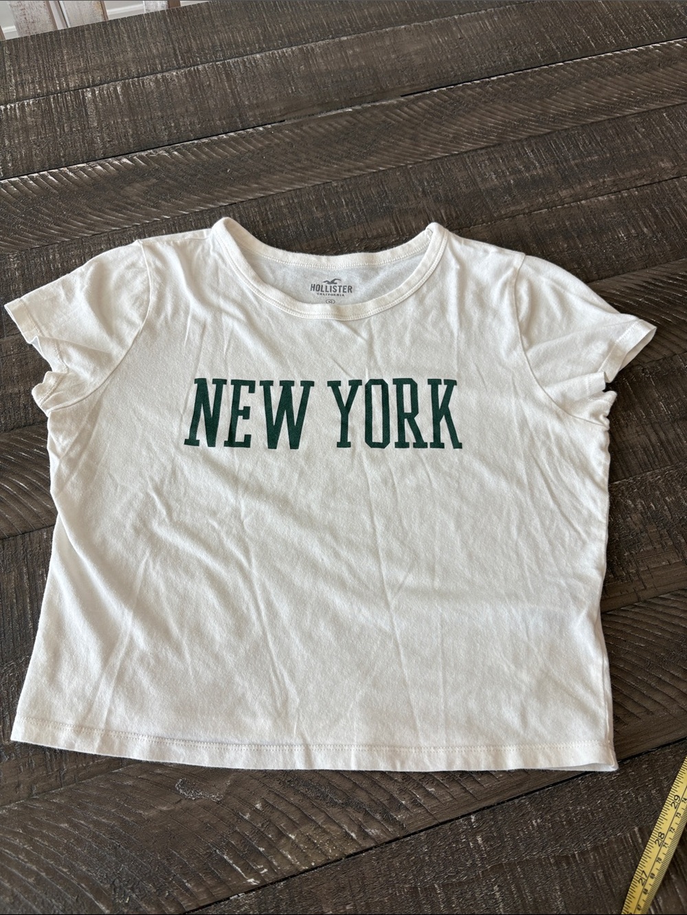 Hollister  White Tee with Green "New York" Graphic. 100% cotton